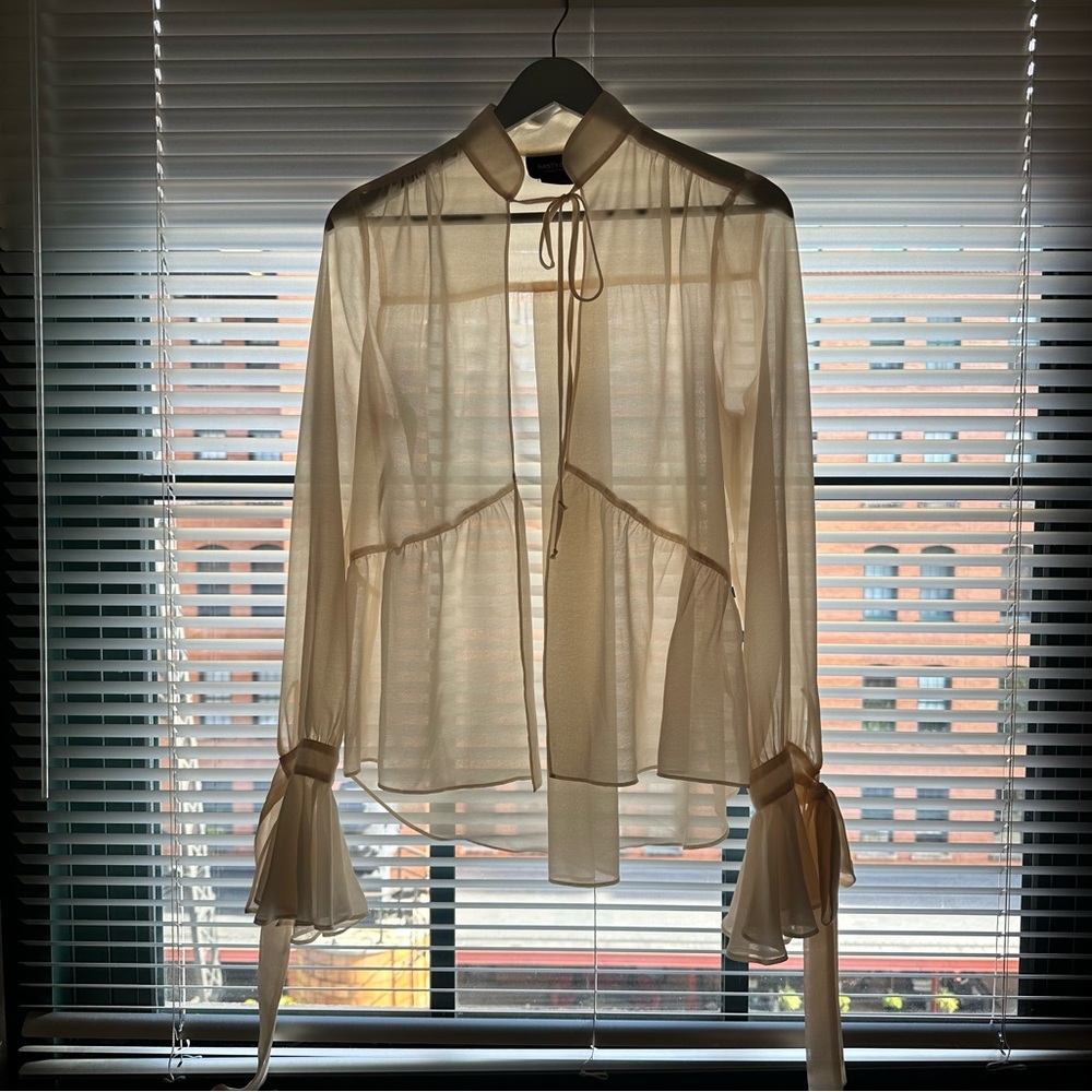 Soft pink sheer top